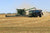 Tractors on the living sky grains farm
